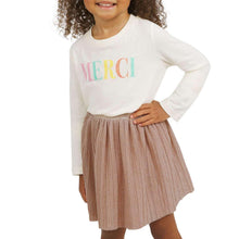 Toddler holiday skirt close-up: mauve rose pleated fabric with elastic waist