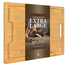 Large bamboo cutting board with long side handle cutouts and flat cutting surface.