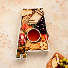 Porcelain state-shaped bake and serve dish with assorted snack foods inside