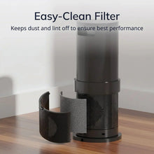 Ceramic space heater with removable dust filter insert at the base, black grille