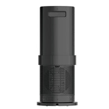 Ceramic space heater rear view with vent grille and carry handle, black housing