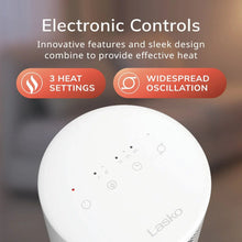 White ceramic space heater with round top control panel and small indicator buttons