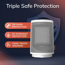 White personal ceramic space heater with front mesh grille and side control panel, 3/4 view