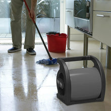 Utility fan with front grille and adjustable top handle, dark gray housing