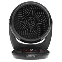 Black ceramic space heater front view with circular fan grille
