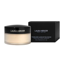 Loose setting powder jar with black lid beside boxed product, translucent beige
