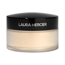 Translucent loose setting powder jar with black lid and beige powder