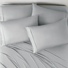 Light gray bed sheet set with pillow shams and matching pillowcases