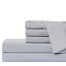 Light gray sheet set with folded flat sheet and fitted sheet, plus pillowcases