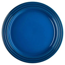 Blue round dinner plate with nested matching plates