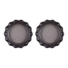 Two fluted pie dishes with underside stamp, dark enamel scalloped edge