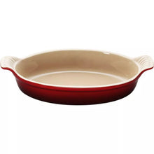 Le Creuset Heritage 1.75 qt au gratin dish, red enamel with two side handles.