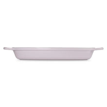 Cast iron oval baker with side handles, low profile and smooth enamel exterior