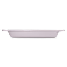 Oval cast iron baker with two side handles, light lavender exterior