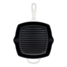 Le Creuset square cast iron grill skillet top view with black ridged plate and loop handle