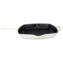 Le Creuset square cast iron grill skillet in white with black ridged cooking surface and side handles