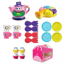 Musical tea party toy pieces: pink teapot, cups, utensils, round plates, cupcake carry case