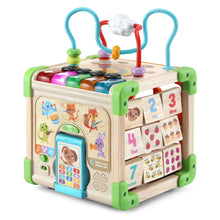 Wooden activity cube toy close-up with number tiles, character panels, and handle bars