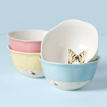 4-piece porcelain dessert bowl set: butterfly decals on pink, yellow, blue bowls with white interiors.