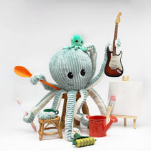 Mint green octopus mom plush with small baby octopus figure on top