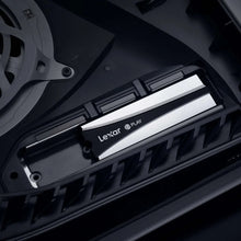 Lexar PLAY M.2 SSD with silver heatsink installed on console interior