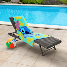 Kids beach towel spread on lounge chair, turquoise Stitch and yellow pineapple print