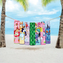 Kids beach towel, colorful cartoon character print, hanging on a line