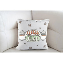 White Central Perk decorative pillow with logo front and small flower icons.