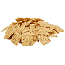 Pile of light tan multigrain cereal squares
