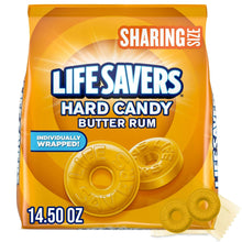Sharing size hard candy bag with yellow butter-rum discs, individually wrapped