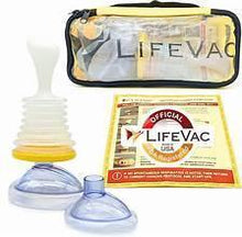 Portable suction rescue device kit with yellow case, masks, and instruction leaflet.