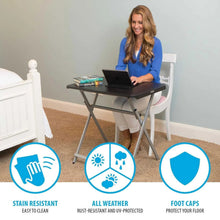 Black folding personal table with dark top and gray angled support legs