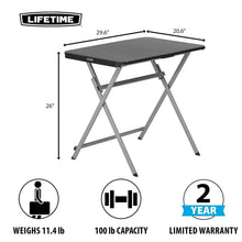 Black foldable personal table with gray X-leg frame and dark tabletop