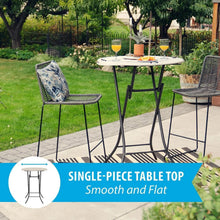Round bistro table with light gray top and black folding frame in outdoor setting