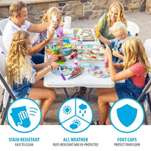 White outdoor folding table with black metal legs