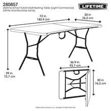 Fold-in-half folding table with black frame and top, shown with size diagram.