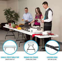White folding banquet table with black legs and wide tabletop