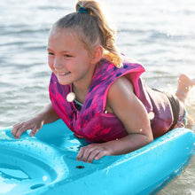 Blue youth sit-on-top kayak with child seated, front cockpit visible.