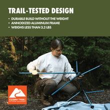 Gray high-back camp chair with blue aluminum frame during assembly