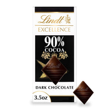Lindt Excellence 90% cocoa dark chocolate bar in box with a few chocolate pieces