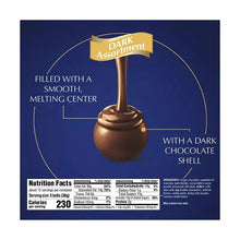 Assorted dark chocolate truffle with dark shell and smooth melting center shown