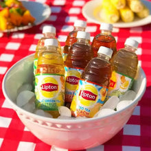 Lipton iced tea bottles in a serving bowl with ice cubes