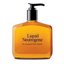 Liquid facial cleanser bottle with black pump, amber translucent formula