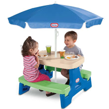 Kids picnic table with blue umbrella, beige tabletop, green and blue base, side bench