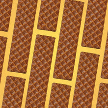 Close-up of Nutty Buddy wafer bars with embossed grid texture