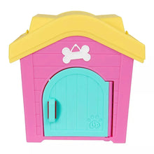 Plastic playset house with yellow roof, pink walls, and a blue arched door