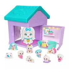 Plastic playset house with teal roof, purple walls, and baby figures with tub