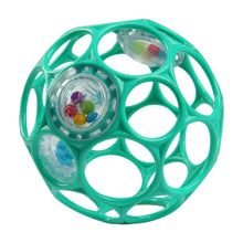 Green plastic teething ball with circular cutouts and bead-filled window
