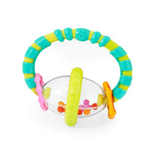 Clear baby rattle with colorful ring and dangling bead elements on a strap handle