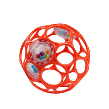 Red plastic teething ball with circular cutouts and bead-filled window